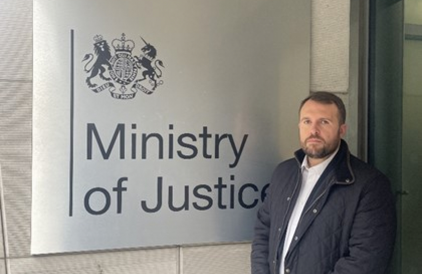 Jonathan at entrance to Ministry for Justice